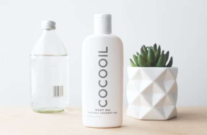 Cocooil bottle and plant